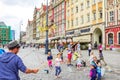 Street entertainer Ã¢â¬â playing with children, making soap bubbles